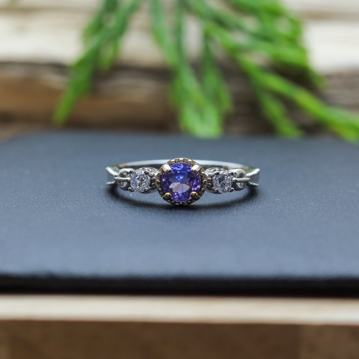 Round Tanzanite Three-Stone Ring in Sterling Silver