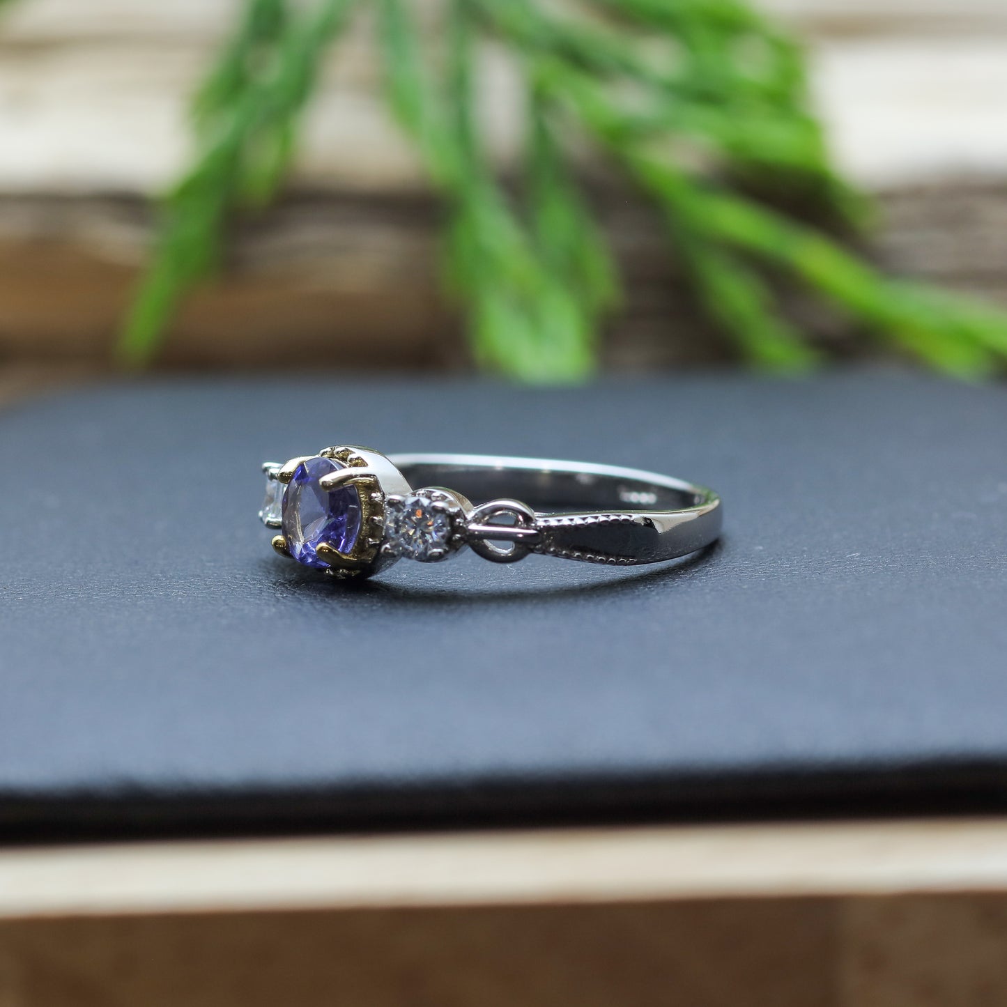 Round Tanzanite Three-Stone Ring in Sterling Silver