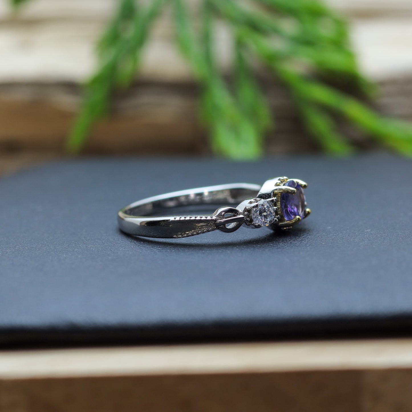 Round Tanzanite Three-Stone Ring in Sterling Silver