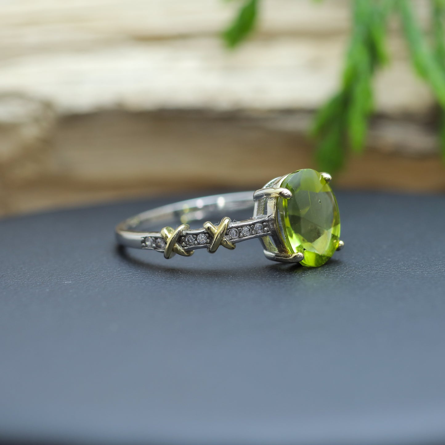 Two-Tone Oval Peridot Accent Ring in Sterling Silver